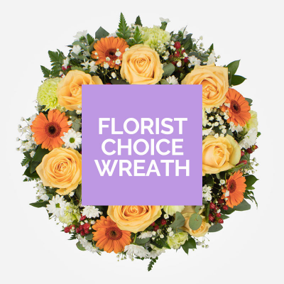 Florists Choice Open Wreath - The wreath will be arranged by a professional florist using the loveliest collection of flowers and foliage of the day .Colours and requested flowers cannot be guaranteed..
