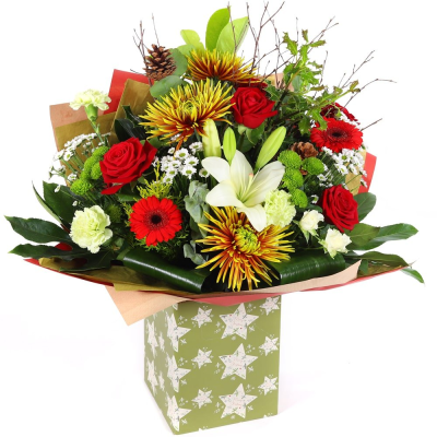 Festive Grandeur - Add a touch of magic to your Christmas gifting with this luxurious bouquet, featuring a blend of red, white, and green flowers adorned with festive additions. Perfectly arranged in a festive-themed box, it's designed to enchant and delight.