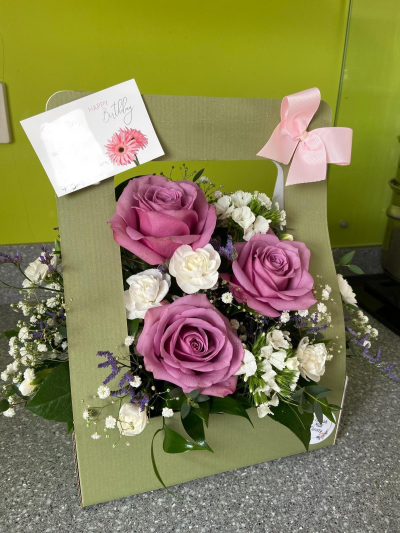 Florist Choice Living Card - A charming floral arrangement designed like a greeting card with a bow, made with fresh seasonal blooms and lovingly hand-crafted by Cornish Maid Floristry.